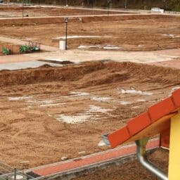 A graded dirt area on a construction site