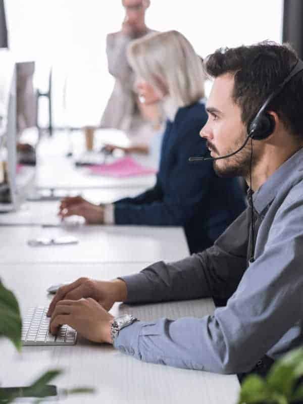 Call Center Operators At Computers