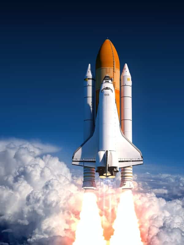 Hm Space Shuttle Launching Above The Clouds